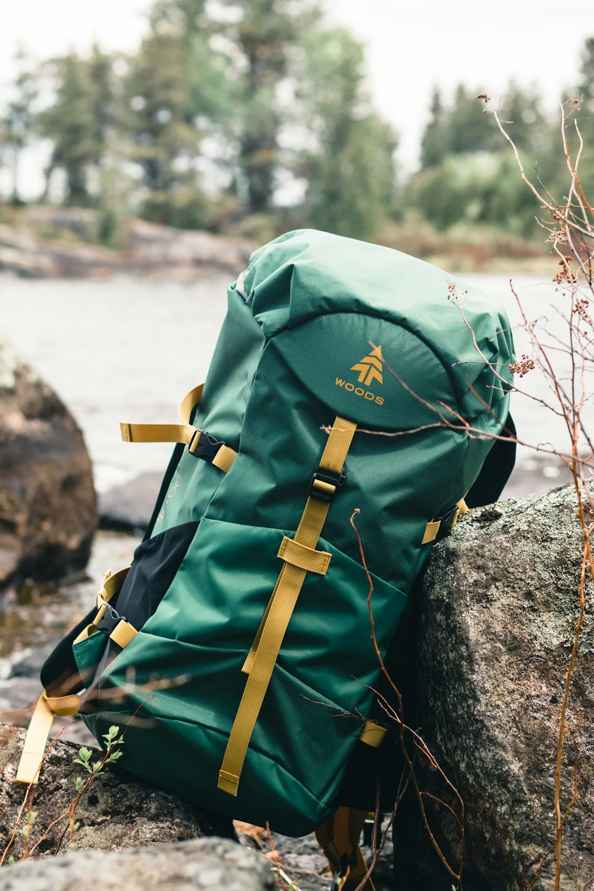 Green hiking backpack resting outdoors